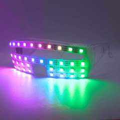 NeuroGlow LED Glasses lit up pink and blue, angled side view