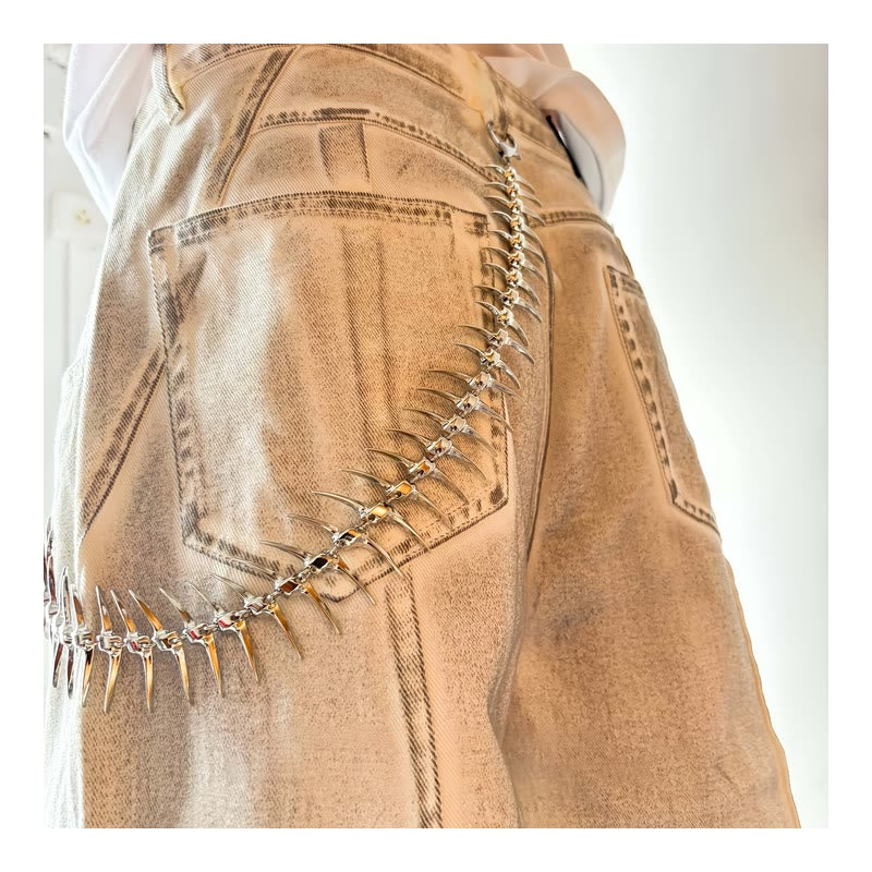 Vertebra Waist Chain worn on cream washed denim pants | styled view
