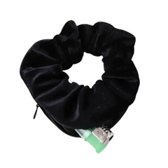 Black velvet zip pocket scrunchie with the zip pocket open
