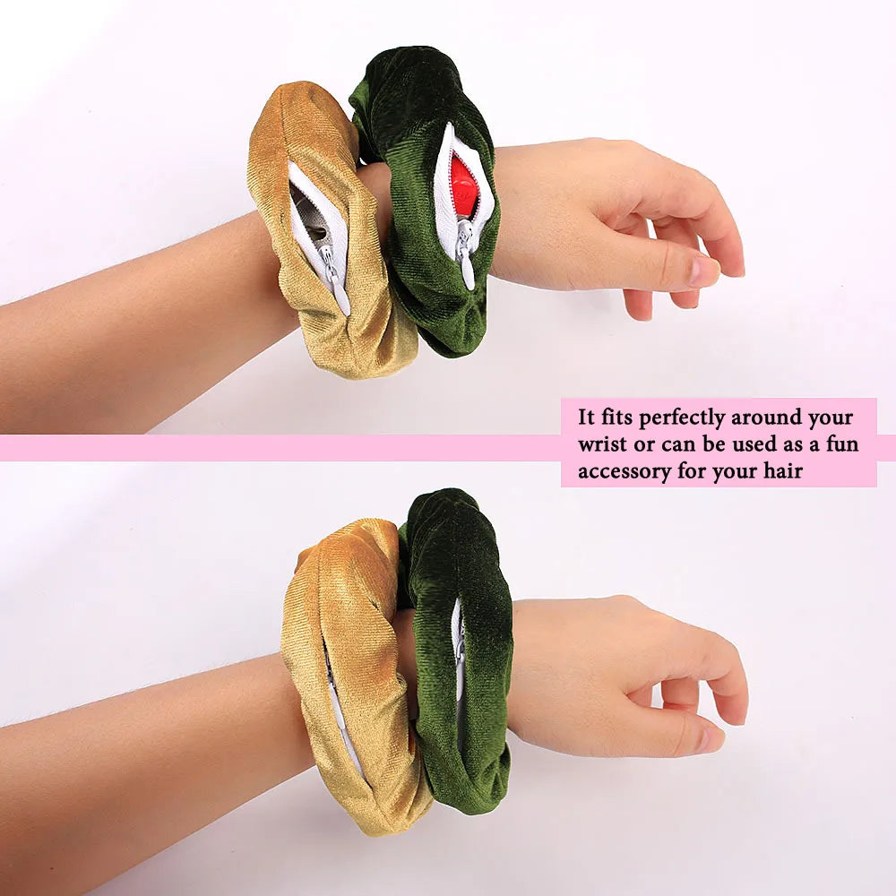 Gold and green velvet zip pocket scrunchie worn on the wrist as a bracelet